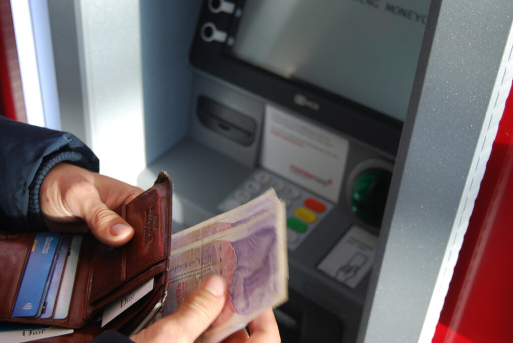 Man withdrawing money from Atm | Cash limit in Italy