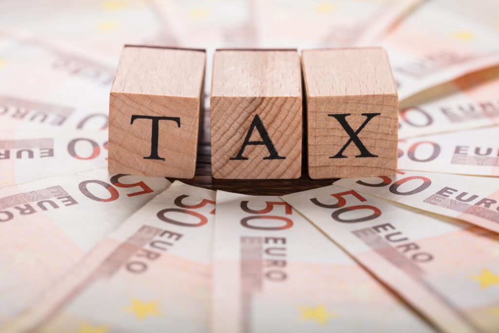 Tax text and bills - Capital Gains Tax in Italy