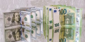 Dolar and Euro bills - The Italy-Canada Tax Treaty